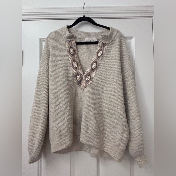 Chic Beige V-Neck Sweater with Intricate Pattern - Picture 1 of 9